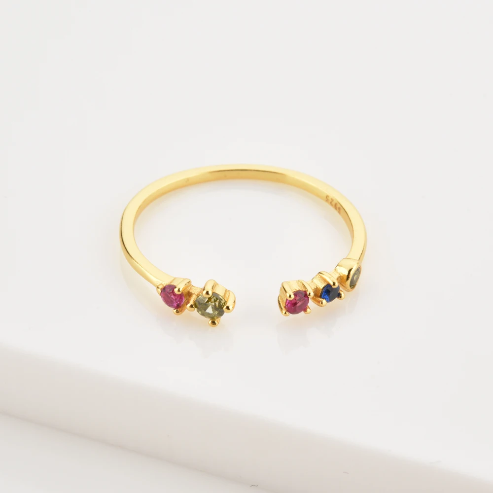 Кольцо женское регулируемое из серебра 100% пробы с радужным кубическим цирконием