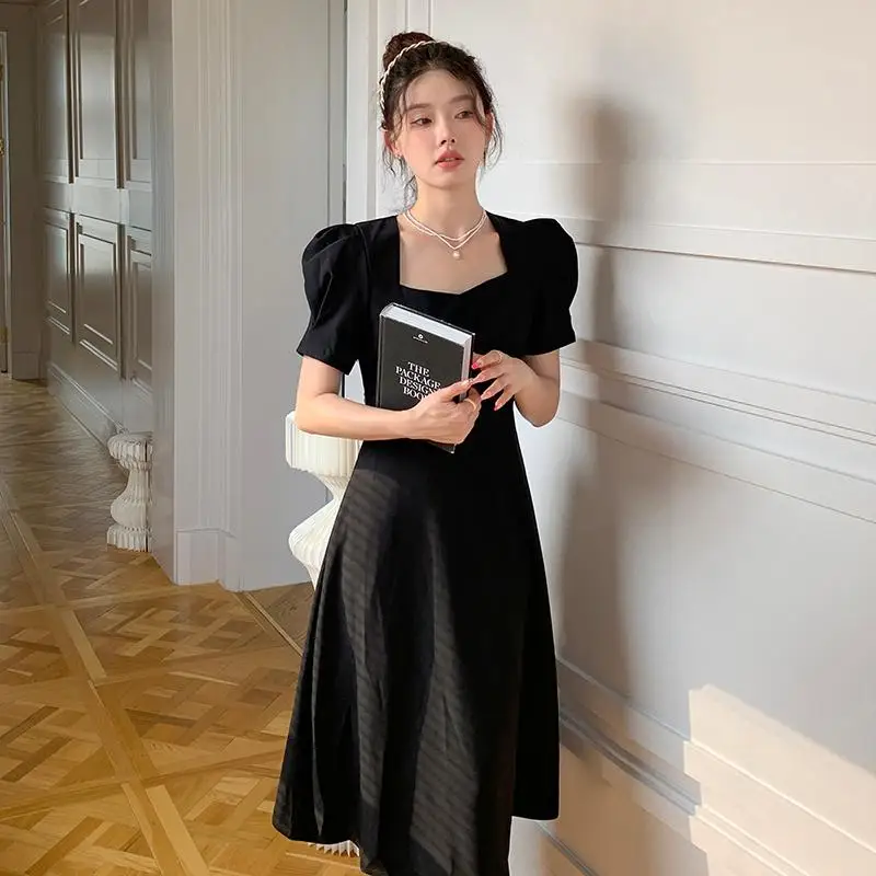 

Tmperamental Summer Hepburn Style Women Mid Long Dresses French Retro High Class Simple Short Sleeve Hollow Out Black Vestidos