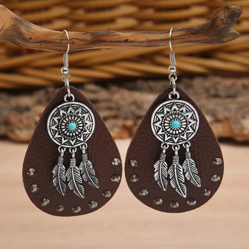 

2022 Jewelry Ethnic Style Exaggerated Alloy Turquoise Feather Earrings Personality Leather Hot Diamond Women Earrings Wholesale