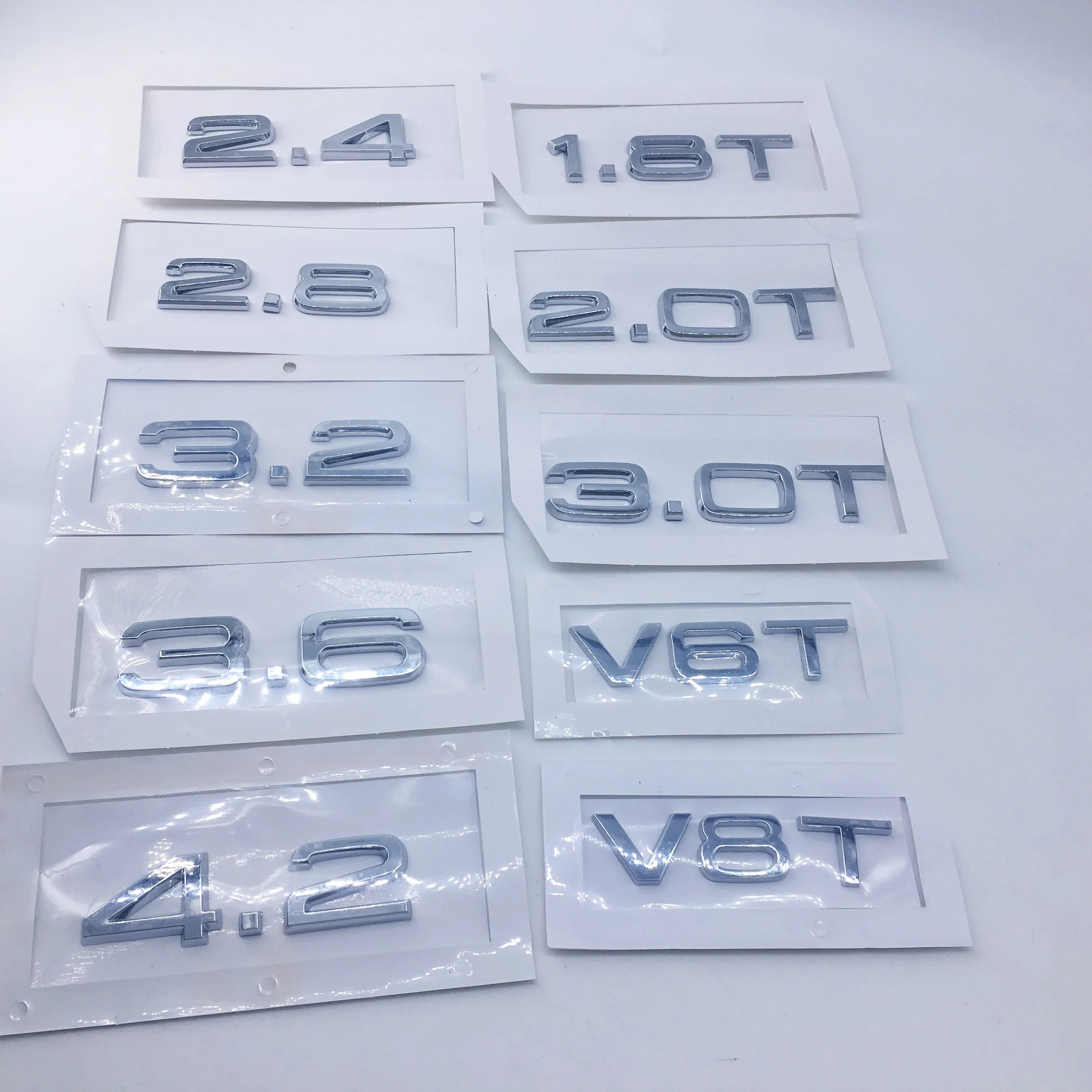 

1 шт. ABS для Audi 1.8T 2.0T 3.0T V6T V8T 2,4 2,8 3,2 3,6 4,2 эмблема заднего багажника логотип значок наклейка объем автомобиля яркий