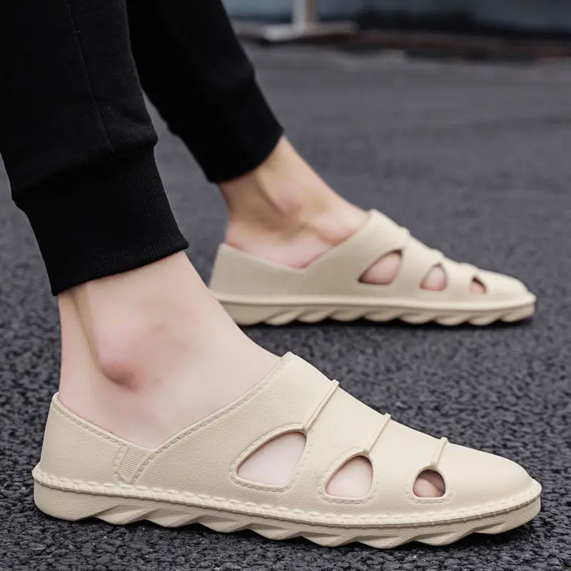 Driving shoes men's summer Baotou soft bottom sandals and slippers Year's new deodorant leather sandals men's casual beach shoes