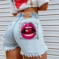 womens summer new hot sale street ins net red cherry lips pocket print pattern hole tassel denim shorts foreign trade
