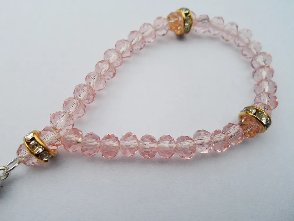 Tiki Official-website по 2 грн Браслет с розовыми кристаллами Женские религиозные