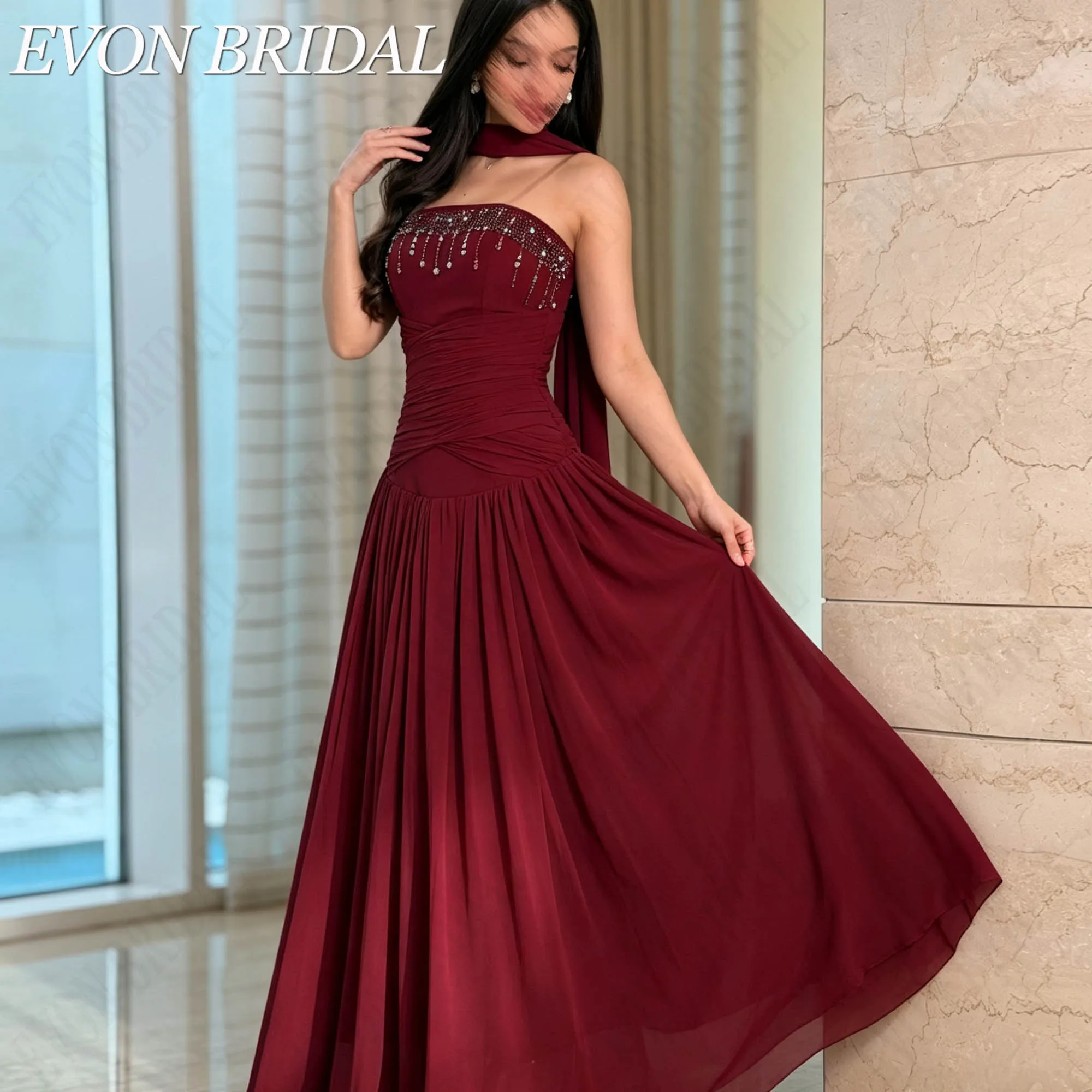 Фото EVON BRIDAL Изготовлено На Заказ Бретельный Шифон Силуэт Линии А Без Рук Бисерная Отделка Вечернее Платье Открытая Спина Низкая Талия Задняя Молния Летающая Шаль Бордовый Винтаж Изящное Праздничное Платье 2026 №5