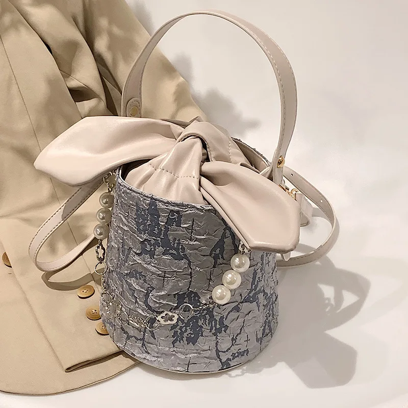 

Kawaii Cylindrical Design 2022 New Small Pu Leather Crossbody Bag With Short Handle For Women Luxury Shoulder Bags Handbags Tote