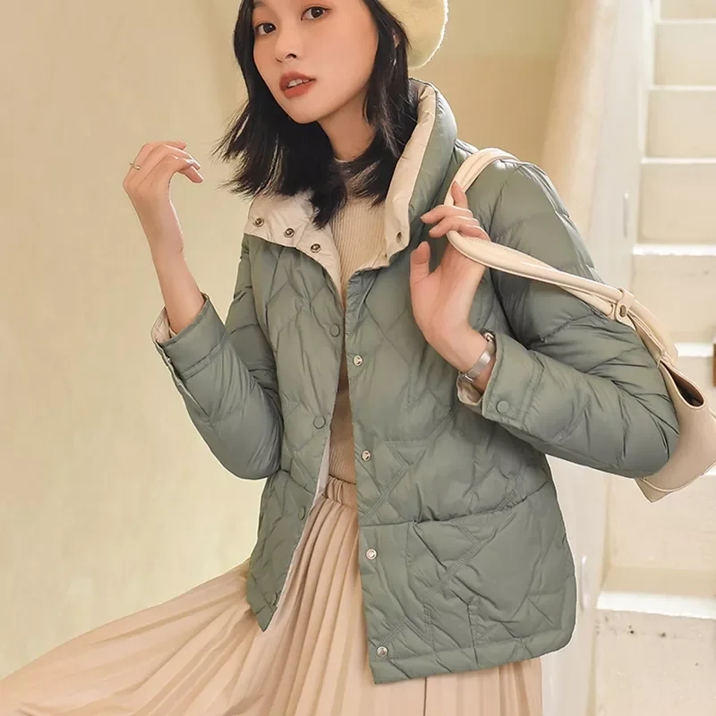 

Женский пуховик на белом утином пуху, с воротником-стойкой