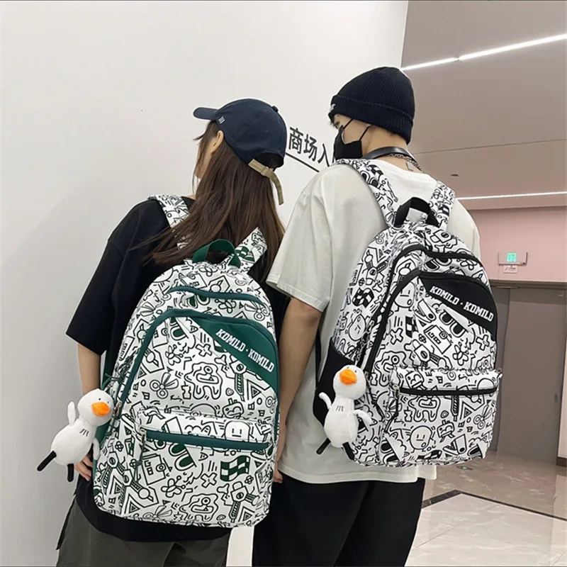 

2022 schoolbag female ins niche Harajuku graffiti design backpack junior high school students large-capacity backpack