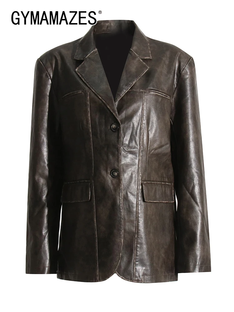 

Пальто женское кожаное однотонное составного кроя с карманами и длинным рукавом