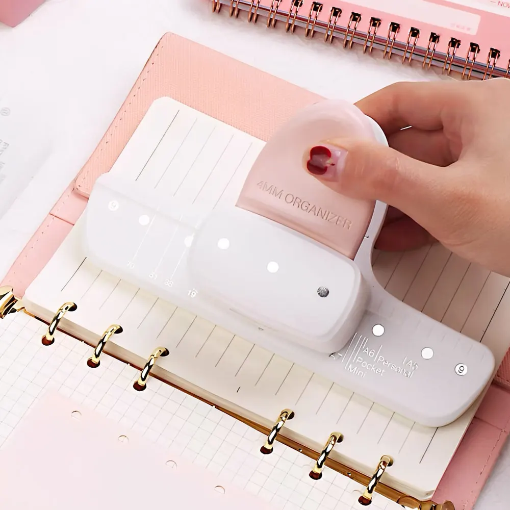 

Дырокол универсальный 3 отверстия 4 мм