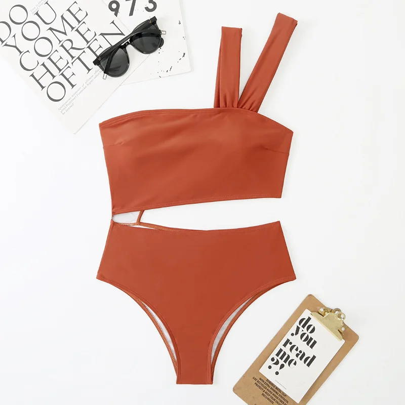 

Hollow Swimsuit One Piece Swimwear Women 2022 New Bodysuit Women Solid Beachwear Backless Bathing Suit High Legs