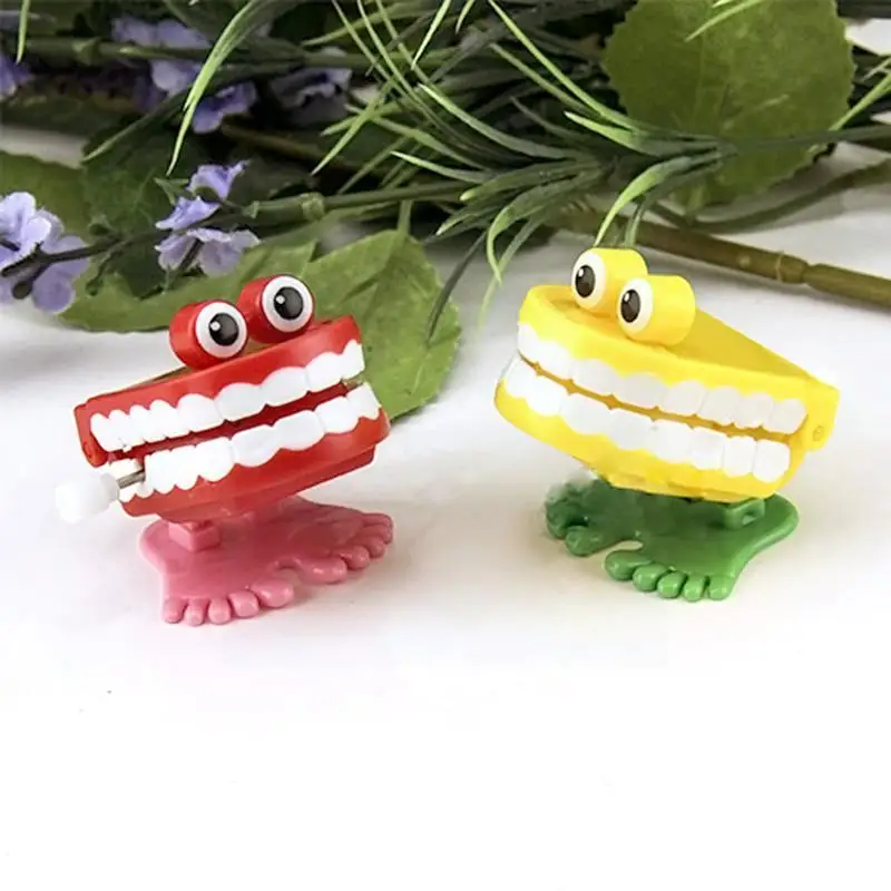 

1pcs Clockwork Toy Upper Chain Jumping Tooth Toy Children Clockwork Toy Teeth Up Spring Jump Wind Running H8c0