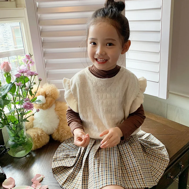 

2022 Autumn Korean Style Baby Girls Knitted Petal Sleeve Vests Sleeveless Pullovers Tops Ruffles Kids Cotton Waistcoats