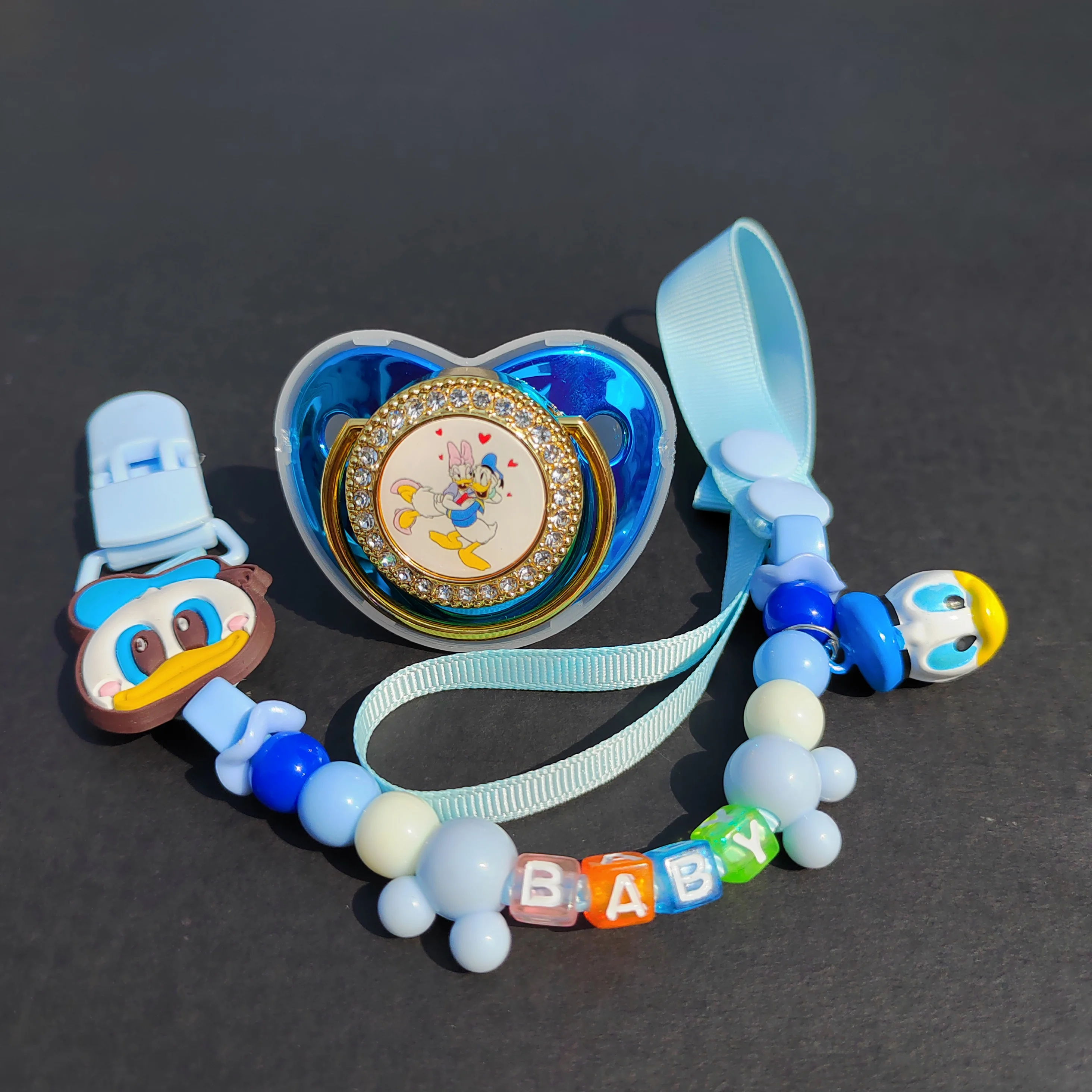 

Deluxe Donald Duck baby pacifier with bead clip 0-24 months metallic blue newborn fake nipple BPA free baby pacifier baby item