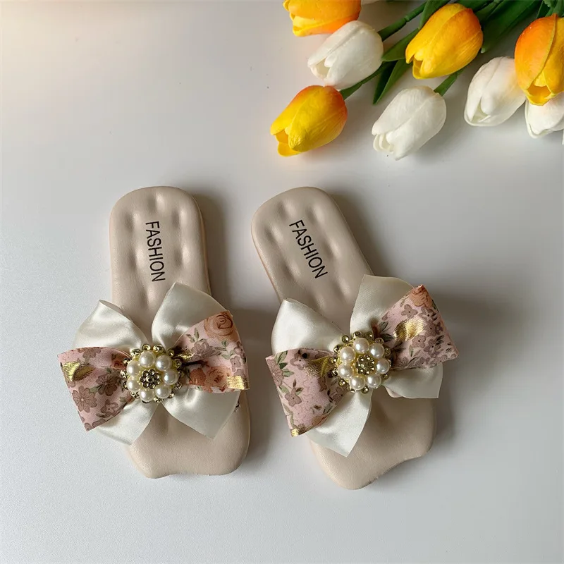2022 New Bowknot Pearl Flower Flat Shoes Open Toed Sandals Anti Slip Flip Flops Children's Home Going Girls' Beach Slippers