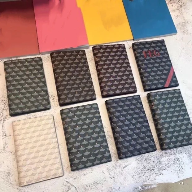 

2022 new European and American fashion cowhide men's and women's passport clip hand style wallet