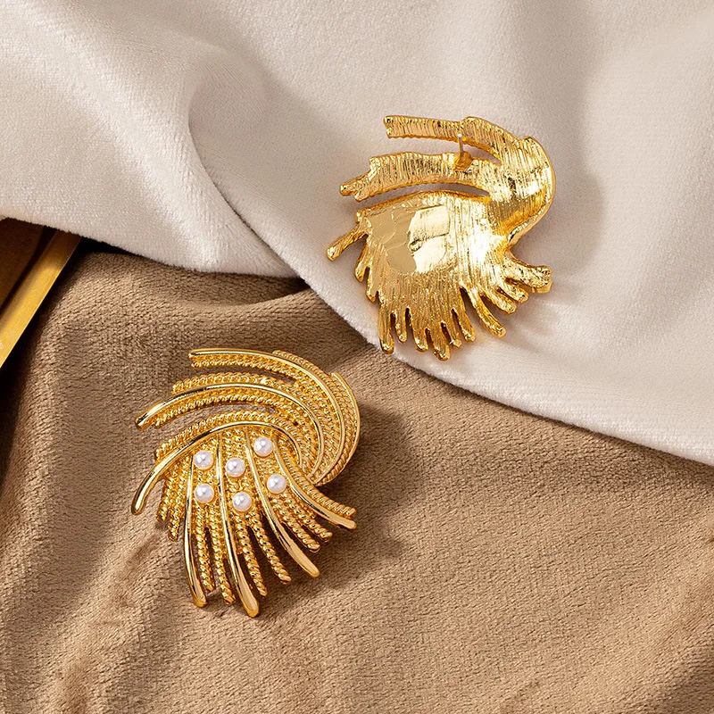 Женские серьги в золотом и серебряном цвете