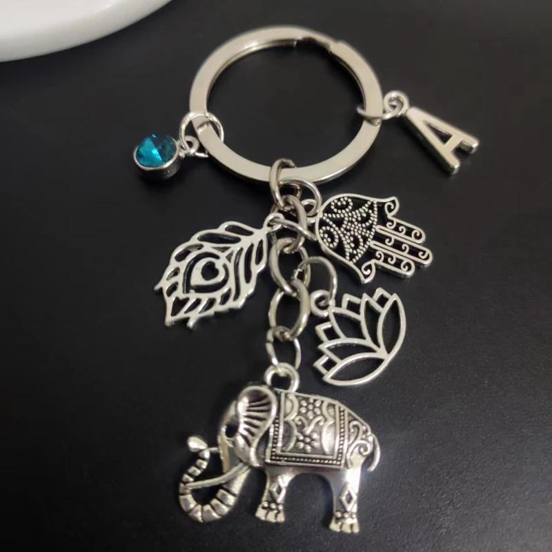 

Elephant Lotus Palm Peacock Feathers 26 Letter Car Key Chains Ring Women Friendship Jewelry Accessories Fashion Pendant Gifts