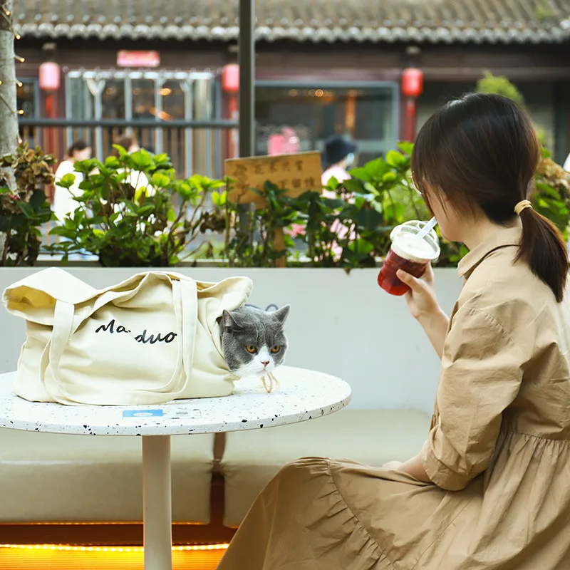 

Cat Backpack Cat Carrying Pet Supplies Small Pet for A Walk Canvas Shoulder Bag Cat Accessories Cat Carrier Pet Items