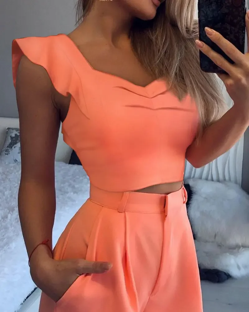 Укороченный топ с рукавами-фонариками и шорты карманами |