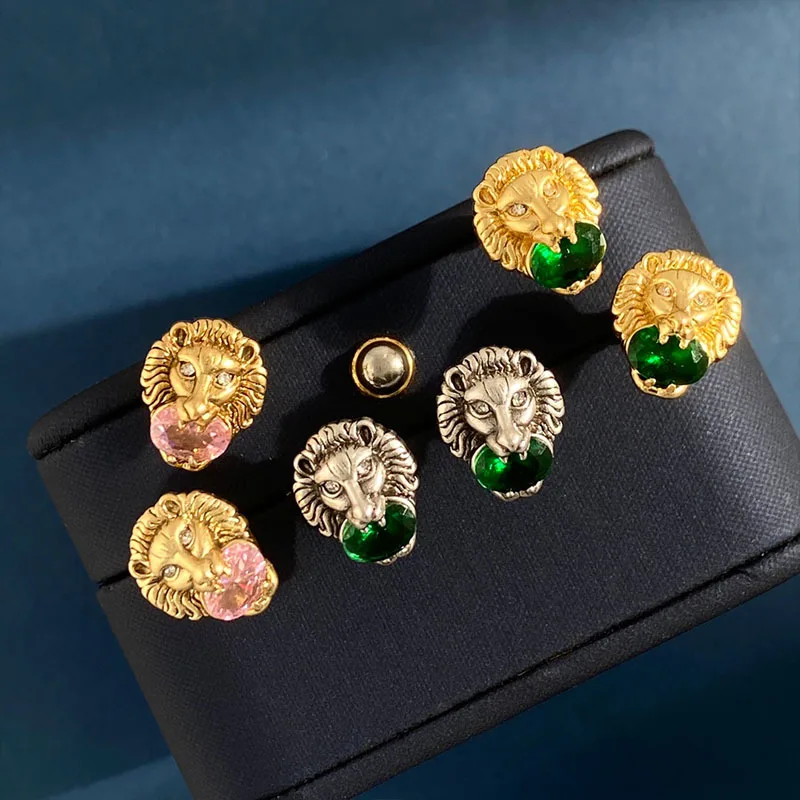 

Medieval Vintage Emerald Crystal Glass Faced Old Lion Head Earrings