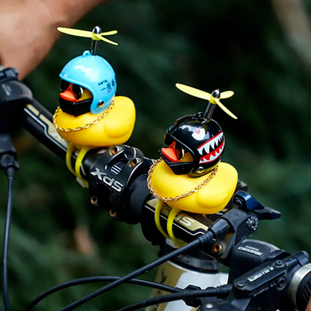 

1PC Propeller Little Yellow Duck Helmet Light Shining Duck Bicycle Warning Bells Handlebar Bicycle Accessories Windmill Toy