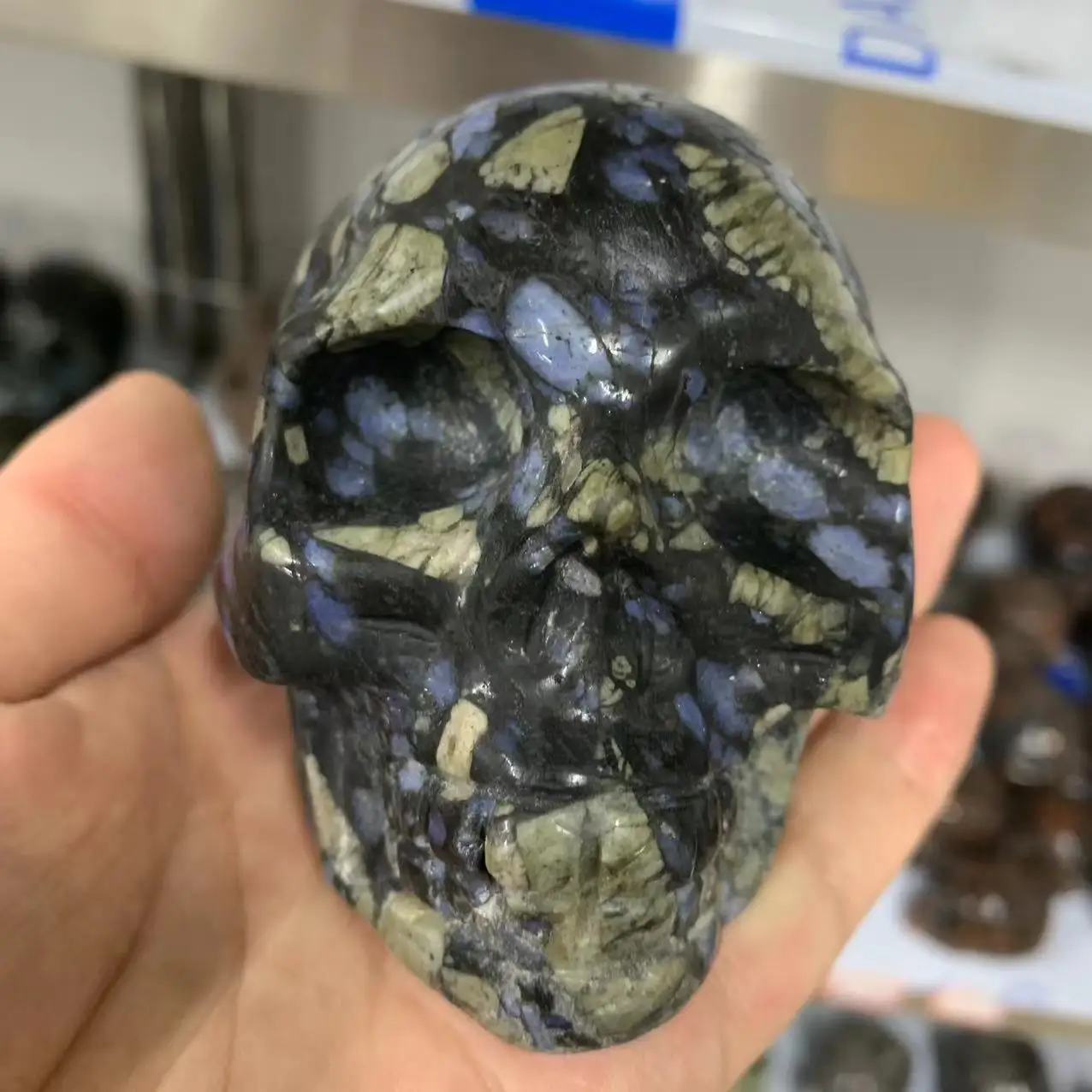

Beautiful Natural Stone Blue Mixed Flash Stone Bone Spirit Meditation Stone Sorcery Skull Stone Feng Shui Crystal