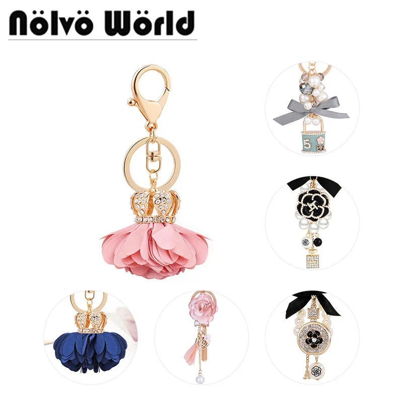 

1-5-10pcs 2022 New Fashion Attractive Design Flat Novelty Beautiful Perfume Flowers Swivel Snap Crown Bow Pearl Key Rings