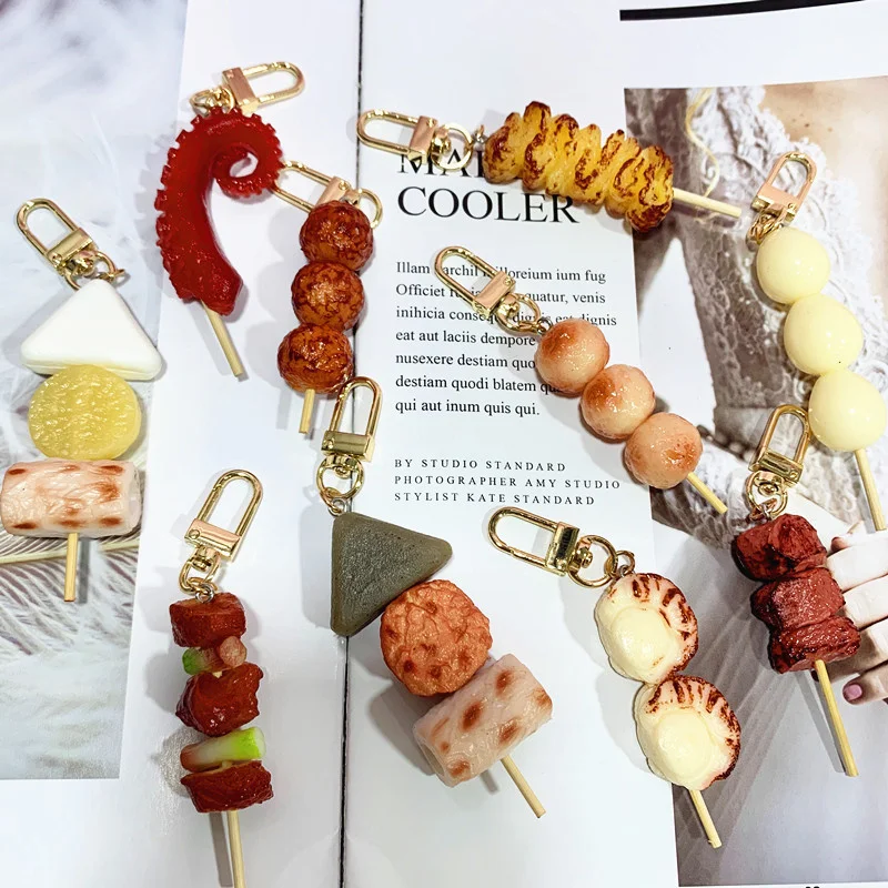 

Japanese and Korean teppanyaki barbecue simulation food barbecue skewers squid mustard gluten oden key chain small gift