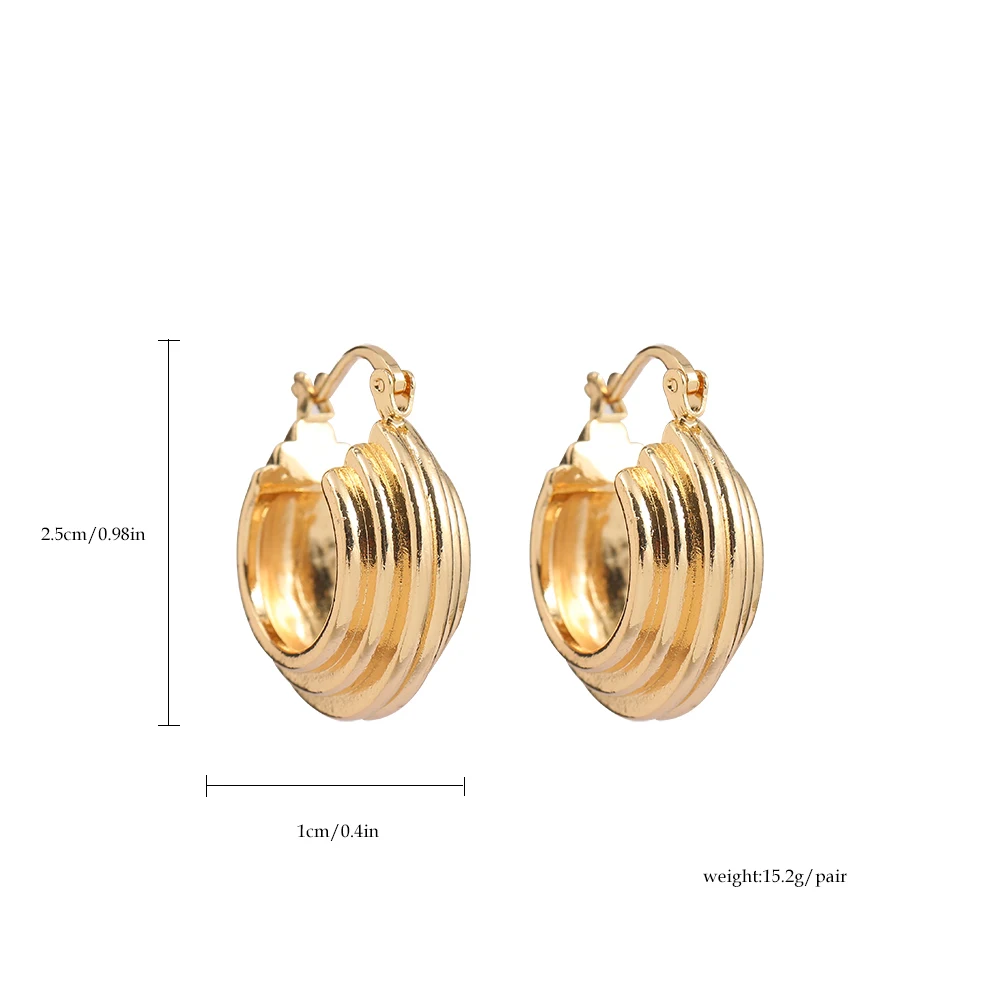 Женские объемные серьги-кольца круглые текстурированные обручи золотого цвета в