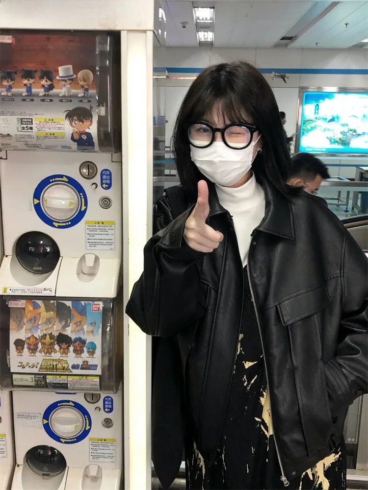 Высококачественное текстурированное кожаное пальто на молнии с лацканами