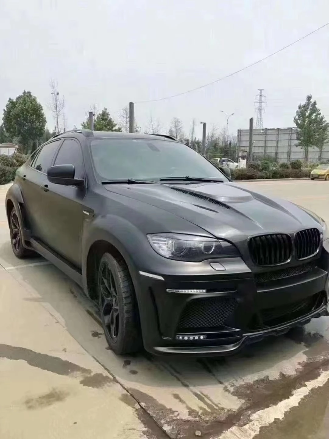 Фото Комплект расширения кузова из материала FRP для BMW X6 в стиле HAMANN: расширители колесных арок, боковые пороги. Поддержка индивидуальной настройки. №3