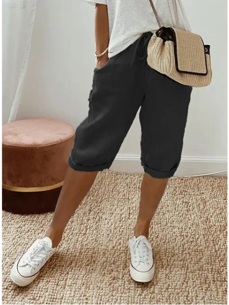 Женские летние шорты средней длины Однотонные эластичные с карманами