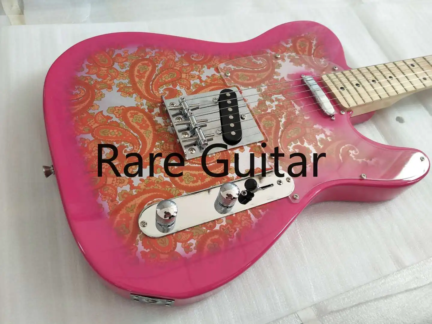 

Custom Classic Brad Pink Paisley Tele Electric Guitar Maple Neck & Fingerboard, Black Dot Inlay, Chrome 3 Saddles Bridge,