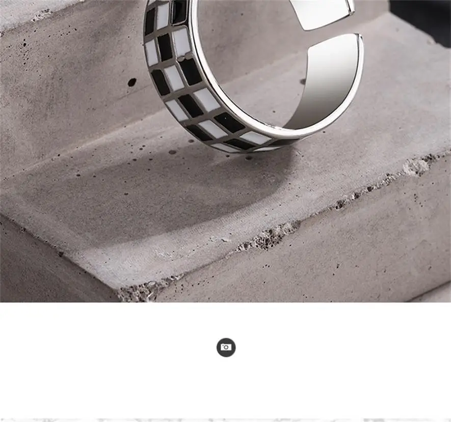 

Open Llack And White Checkerboard Geometry Ring