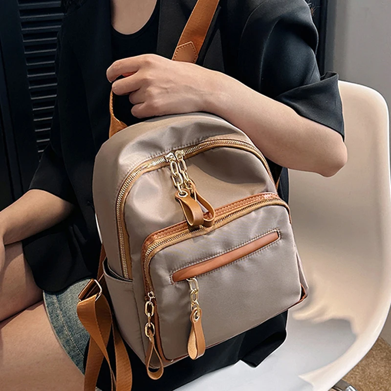 

Women Casual Backpack Fashion Waterproof Nylon School Bag for Teenage Girls Solid Light Weight Small Travel Backpacks Mochilas