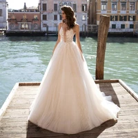 spring sleeveless tulle wedding dress a line deep v neck lace appliques spaghetti straps backless sweep train bride gown