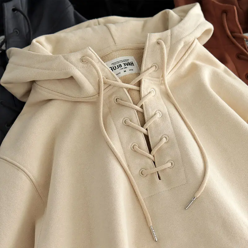 

design sense of niche tie rope sweater female spring and autumn loose thin paragraph versatile solid color hooded jacket2023