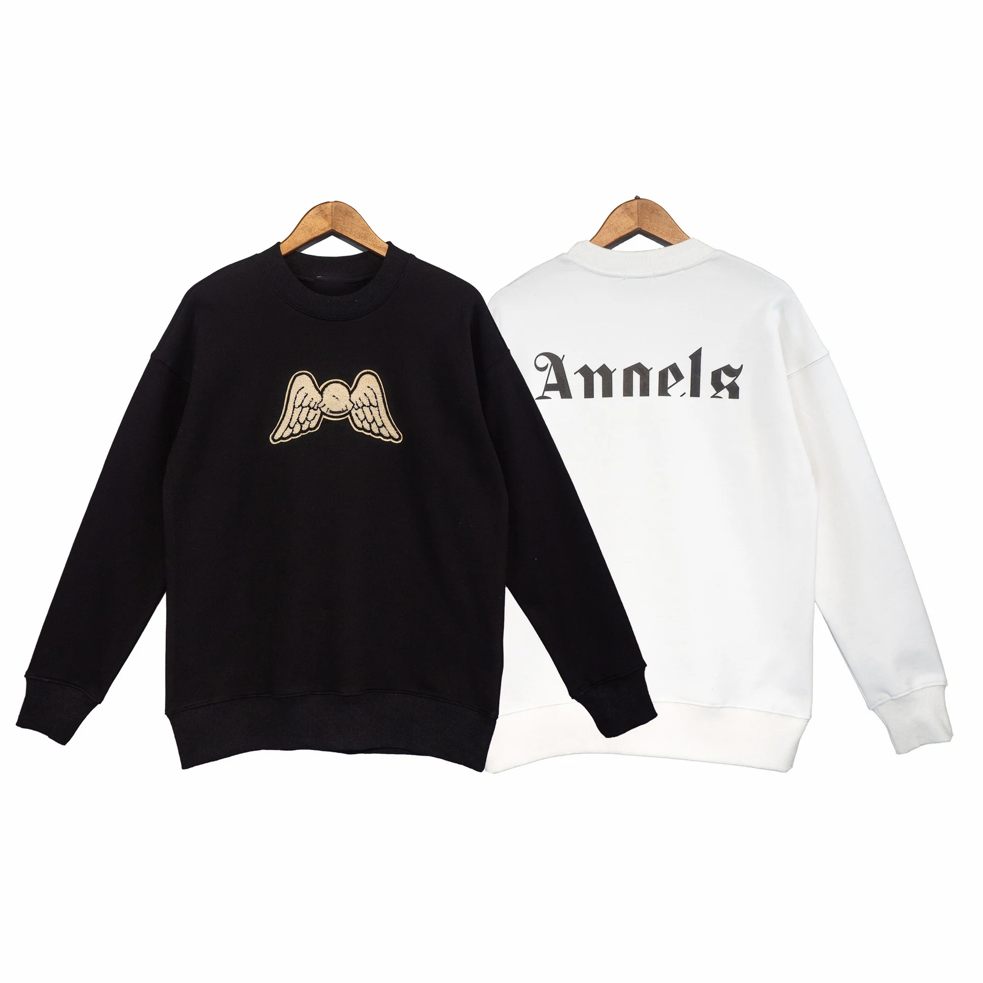 

PALMS Spring Festival Angel Meng joint name cotton small wings black letters loose solid color tide brand casual sweater