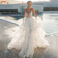romantic tiered tulle wedding dresses beach vestido de novia lace beaded spaghetti straps v neck bridal gowns %d1%81%d0%b2%d0%b0%d0%b4%d0%b5%d0%b1%d0%bd%d0%be%d0%b5 %d0%bf%d0%bb%d0%b0%d1%82%d1%8c%d0%b5