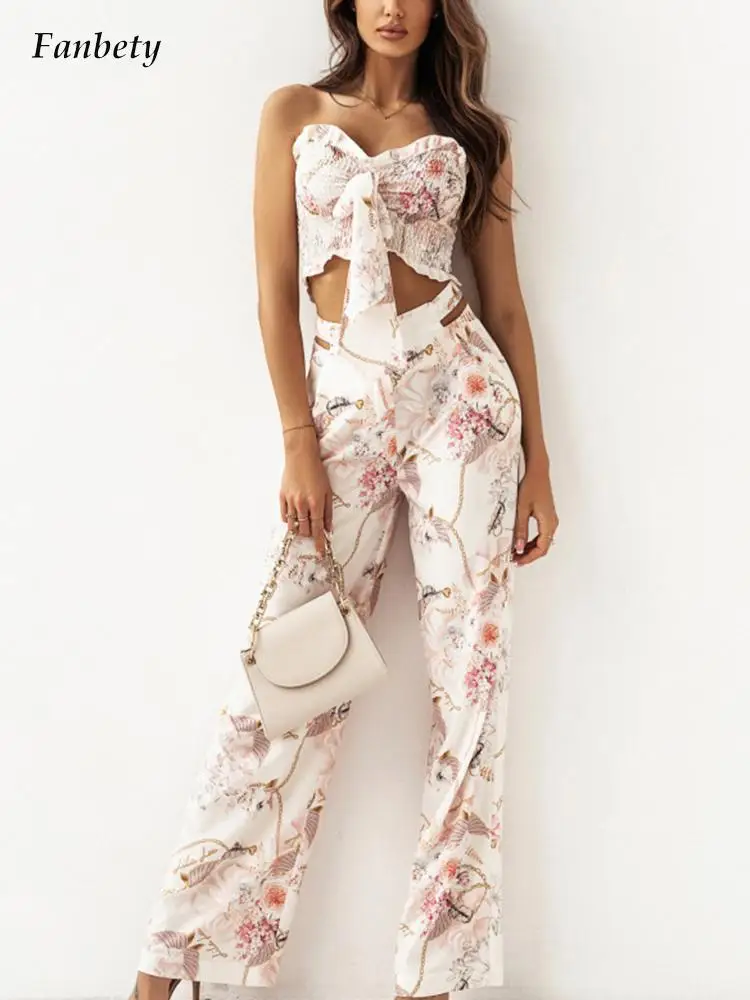 

Комплект из двух предметов Женский, элегантный модный короткий топ без рукавов с открытой спиной и брюки с широкими штанинами, с цветочным п...