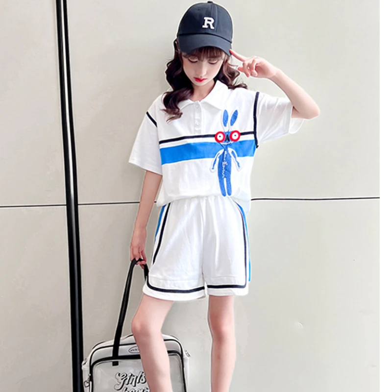 

Детская одежда в Корейском стиле, Новинка лета 2023, модный топ с принтом в стиле пэчворк, рубашка поло + шорты, детская одежда из 2 предметов для девочек, повседневные комплекты