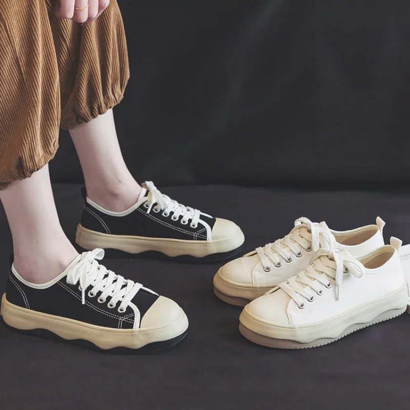 

Повседневные холщовые туфли на шнуровке с резиновыми перекрестными ремешками, низкие (высотой топа менее 10 см), однотонные