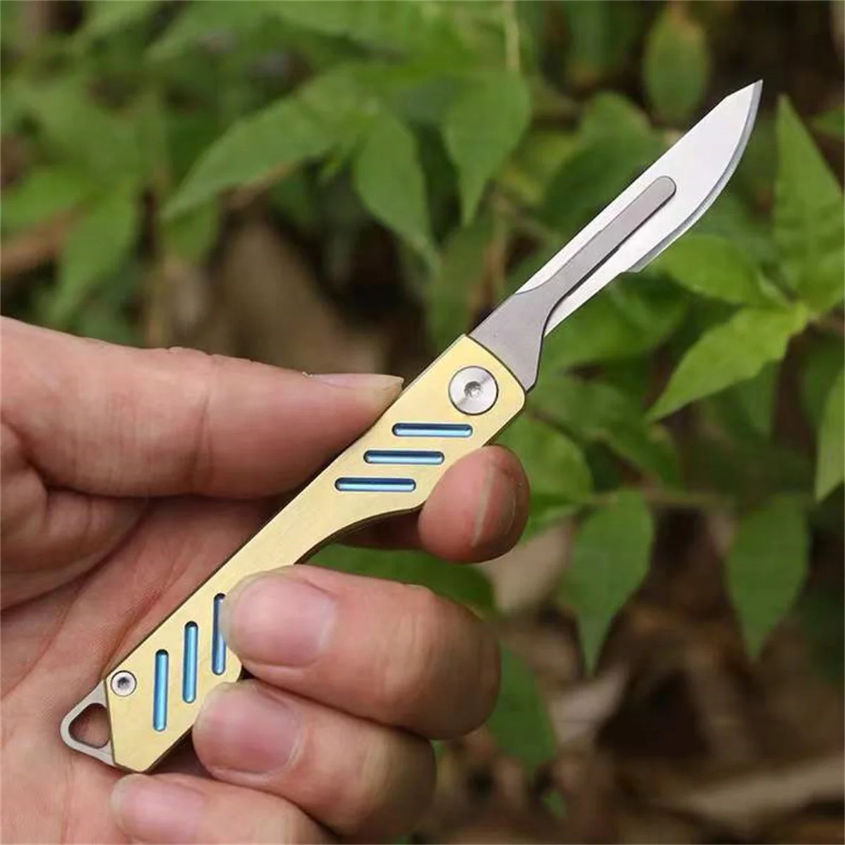 

Titanium Alloy Utility Knife Mini Portable EDC Tactical Tool Keychain Folding Knife