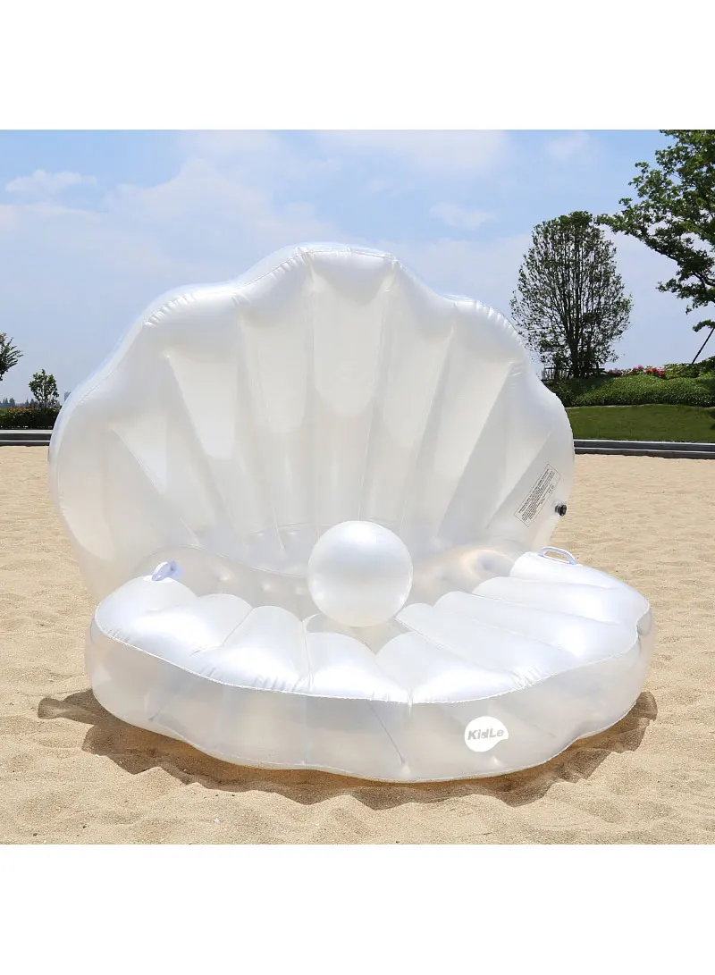 

Row swimming floating on shell shape Pearl