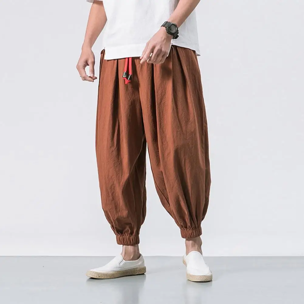 

Шаровары мужские с карманами, свободные штаны на шнуровке, популярные брюки в стиле хип-хоп на шнуровке, уличная одежда