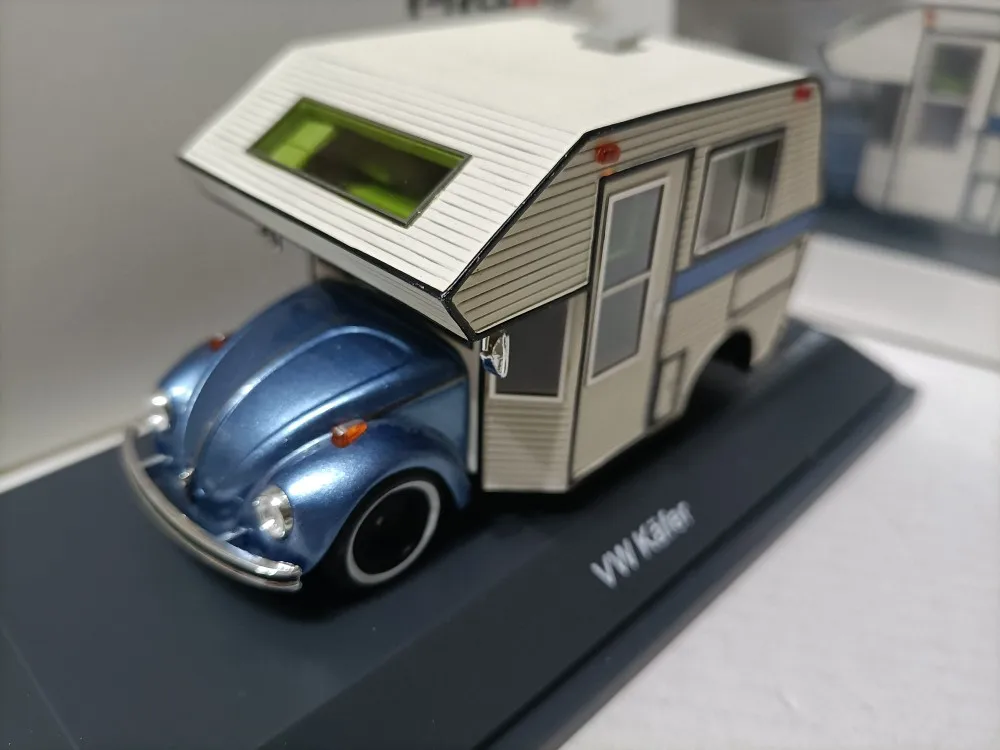 

Schuco 1/43 VW Beetle Camping modified station wagon camper model