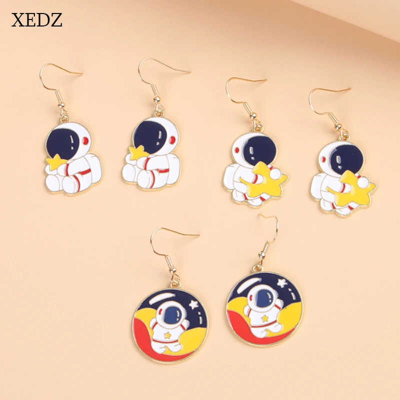 

XEDZ Trendy Astronaut Holding Star Alloy Ear Hooks Cartoon Colorful Space Pendant Earrings Jewelry For Aerospace Enthusiast