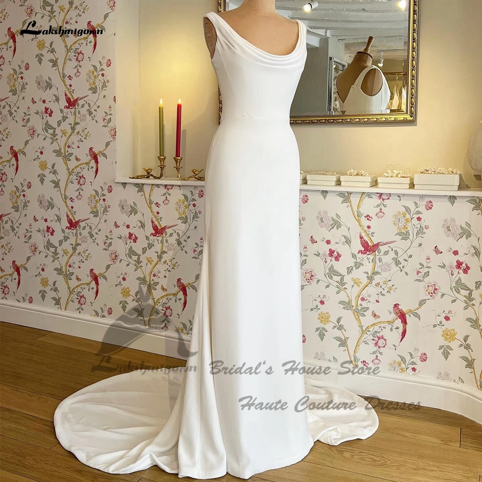 

Платье Lakshmigown свадебное ТРАПЕЦИЕВИДНОЕ из белого тюля с объемными цветами