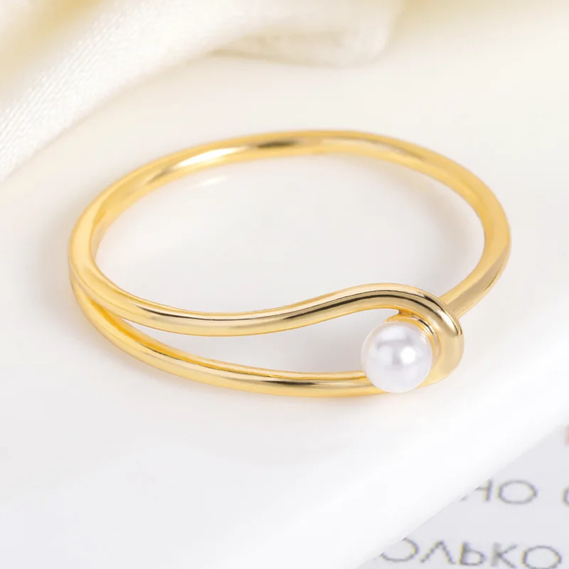 

Korean version of the simple new fashion ring ins wind geometric shape ring 18K gold-plated pearl ladies ring spot