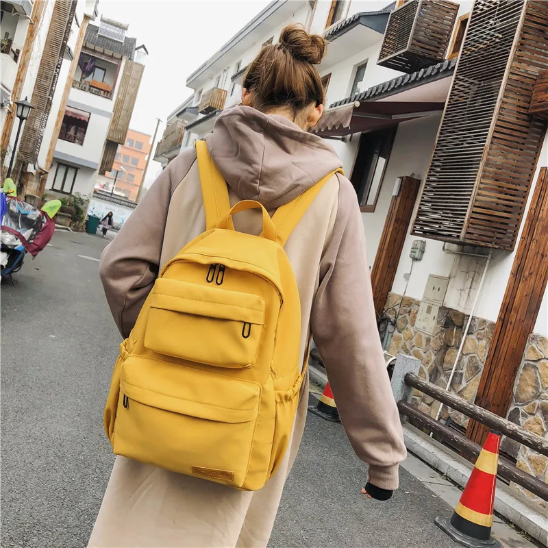 

New Solid Color Large Backpack Young Girls Men Korean Style Kawaii School Bag Shoulder Bag High School Students Nylon Backpacks